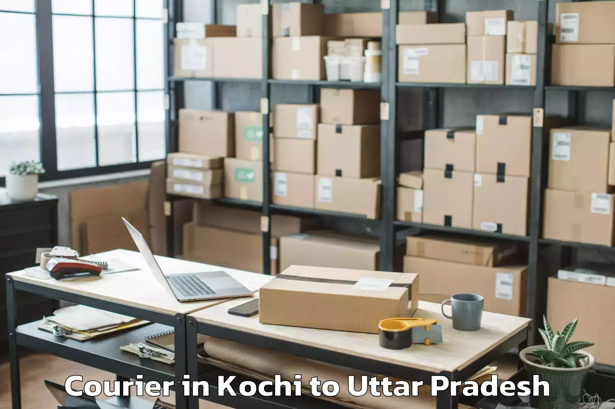 Get Kochi to Rasra Courier